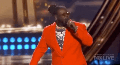 iheartradio music awards red suit GIF by iHeartRadio