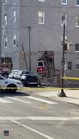 Fire Truck Crashes Through Building in Philadelphia