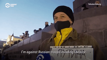 Police Detain Protesters in Russia...
