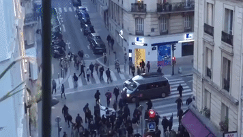 Protesters Flee Police During May Day Protests in Paris