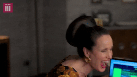 TV gif. Andie MacDowell as Ivy in Cuckoo laughs hysterically as she leans back with her eyes closed and mouth gaping open, on a continuous loop that makes it look like she's rocking back and forth.