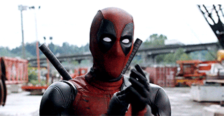 Movie gif. Deadpool gives us some (possibly sarcastic) applause.