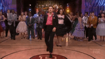 spin GIF by Grease Live