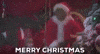 Movie gif. Jim Carrey as The Grinch dressed as Santa jumps up and spreads his arms wide. yelling what the text reads, "Merry Christmas!" 
