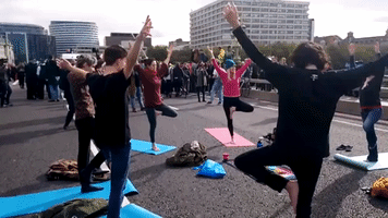 Yoga, Dance and Song on Westminster Bridge During Extinction Rebellion Blockade