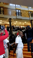 Irate Norwegian Cruise Line Passengers Shout at Captain, Chant 'Refund'