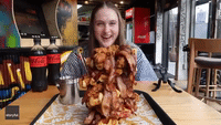 Competitive Eater Completes 8,000-Calorie Chicken-and-Waffle Challenge