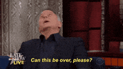 Late Show gif. Paul Reiser shakes his head crazily before dropping his head to his chin and begging, "Can this be over PLEASE?"