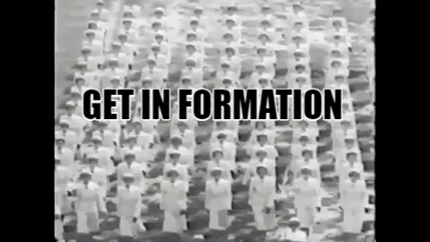 Formation Marching GIF by LaGuardia-Wagner Archives