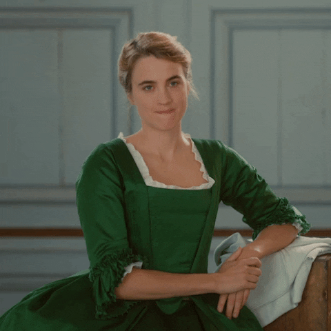 Movie gif. Adèle Haenel as Héloïse in Portrait of a Lady On Fire. She poses for her portrait to be drawn and she looks interested as she confidently raises her eyebrows and asks with a smile, "Really?"