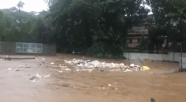 Floodwater Creates 'Whirlpool of Rubbish' in Indian City of Thane