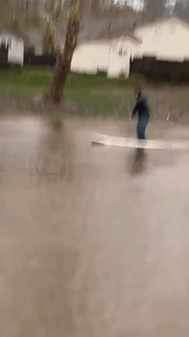 Goleta Resident Paddleboards Through Flooded Santa Barbara County