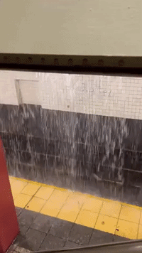 Water Pours Down Onto 42nd Street Subway Platform Amid Heavy Rainfall