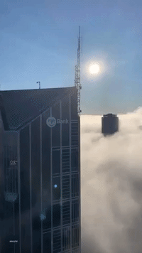 Construction Worker Films Stunning Eagle-Eye View of Cloud-Covered Melbourne