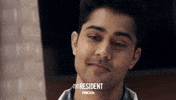 the resident smile GIF