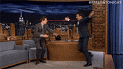 andy samberg hug GIF