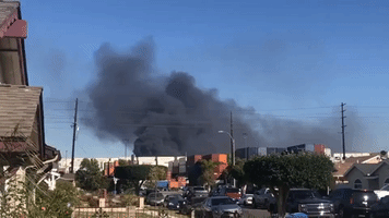 Thick Smoke Billows From Fire at Los Angeles Train Yard