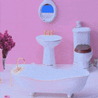 Sponsored gif. A hand places a gingerbread woman into a miniature bathtub. The cookie is wearing a turban and is wrapped in a towel with the Canada Dry logo. Text: "I regret nothing"