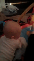 Cute Baby Laughs at Mum's Feet