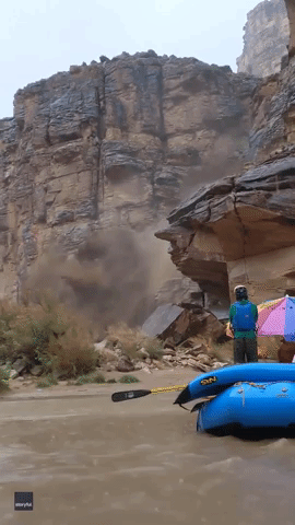 Water and Debris Floods Into Grand Canyon