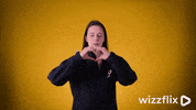 Wizzflix_ heart laughing yellow heartbeat GIF