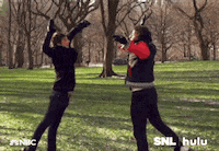high five saturday night live GIF by HULU