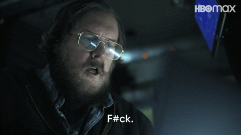 TV gif. Steve Agee as John in The Peacemaker. He's looking at something on his computer but it goes terribly wrong and he clutches his face with both hands while yelling, "FUCK!"