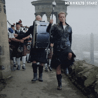 Marching Sam Heughan GIF by Men in Kilts: A Roadtrip with Sam and Graham