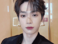 Smirk Zooming In GIF