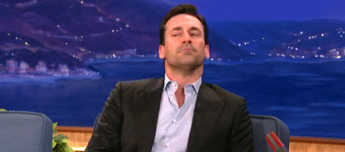 Celebrity gif. Jon Hamm is being interviewed and he raises his chin high in the air while frowning exaggeratedly and nodding, acting as if he agrees with what is being said.