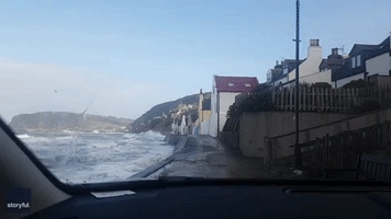 Daredevil Driver Braves Powerful Waves Along Scottish Coast