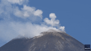 Mount Etna Blows Volcanic Smoke Rings Into Sicilian Sky