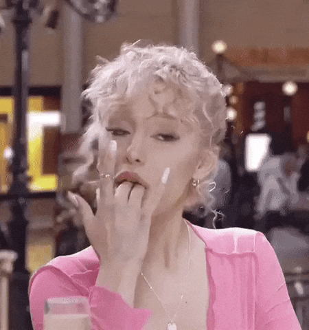 Licking Ariana Grande GIF