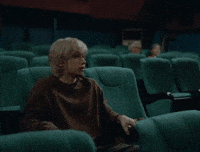 Cinema Sitting Down GIF