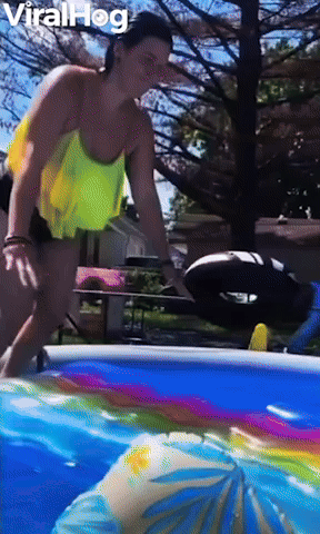 Woman Slides Straight Across Pool on Raft