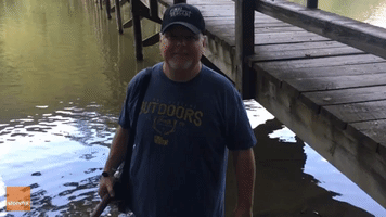 Outdoorsman Combines Fishing and Banjo Practice