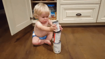 11-Month-Old Boy Stacks Cans Like a Champion