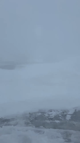 Strong Winds Blow Snow Across Lake in Minnesota