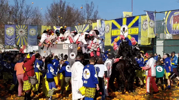 Masked Revelers Reenact Medieval 'Battle of the Oranges' in Northern Italy