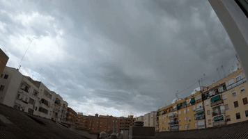 Lightning Flashes in Valencia Sky Amid Stormy Weather in Spain