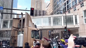 Protesters Climb Semi-Truck After it Drives Near Minneapolis Crowd Celebrating Chauvin Conviction
