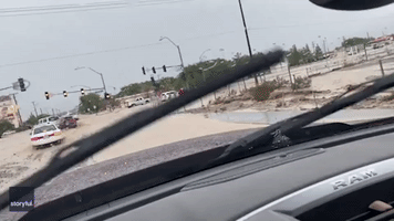Roadways Submerged After Flash Flooding Hits Nevada Town