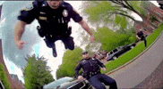 Reaching Cop Car GIF