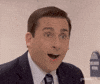 The Office gif. Actor Steve Carell as Michael in The Office hangs his mouth open in happy shock and is blown back by surprise. 