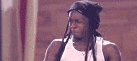 Celebrity gif. Lil Wayne cringes and then pushes his hair behind his ear nervously.
