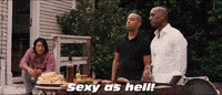Movie gif. Tyrese Gibson as Roman, Ludacris as Tej, and Sung as Han in Fast and Furious 6. They're all outside at a cookout and Roman and Tej watch someone walk by, saying, "Sexy as hell," in unison. Hang sits at the stairs with a beer and watches them amusedly.