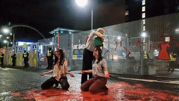 Protesters Drenched in 'Blood Bath' Outside Entrance to COP26 Climate Summit