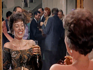breakfast at tiffany's lol GIF by O&O, Inc