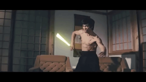 bruce lee lightsaber GIF