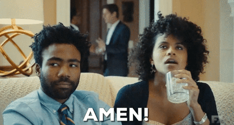 TV gif. Donald Glover as Earnest and Zazie Beetz as Vanessa in Atlanta. She high fives someone while taking a sip of her drink and says, "Amen!"